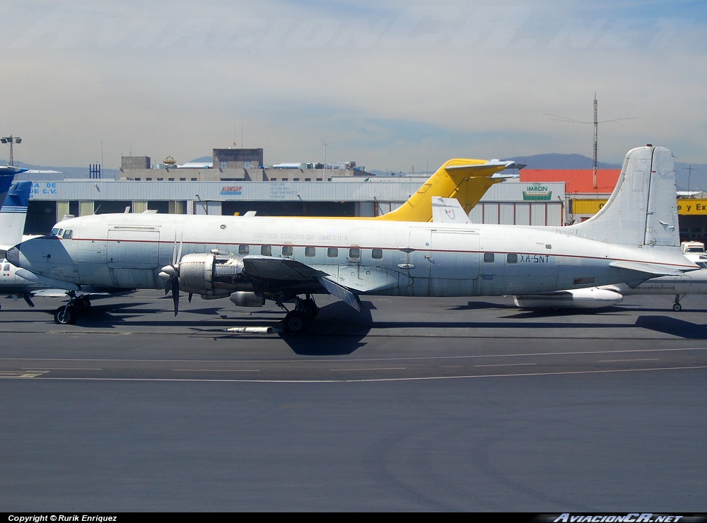 XA-SNT - Douglas DC-6 (C-118/R6D/Liftmaster) - Carga del Caribe